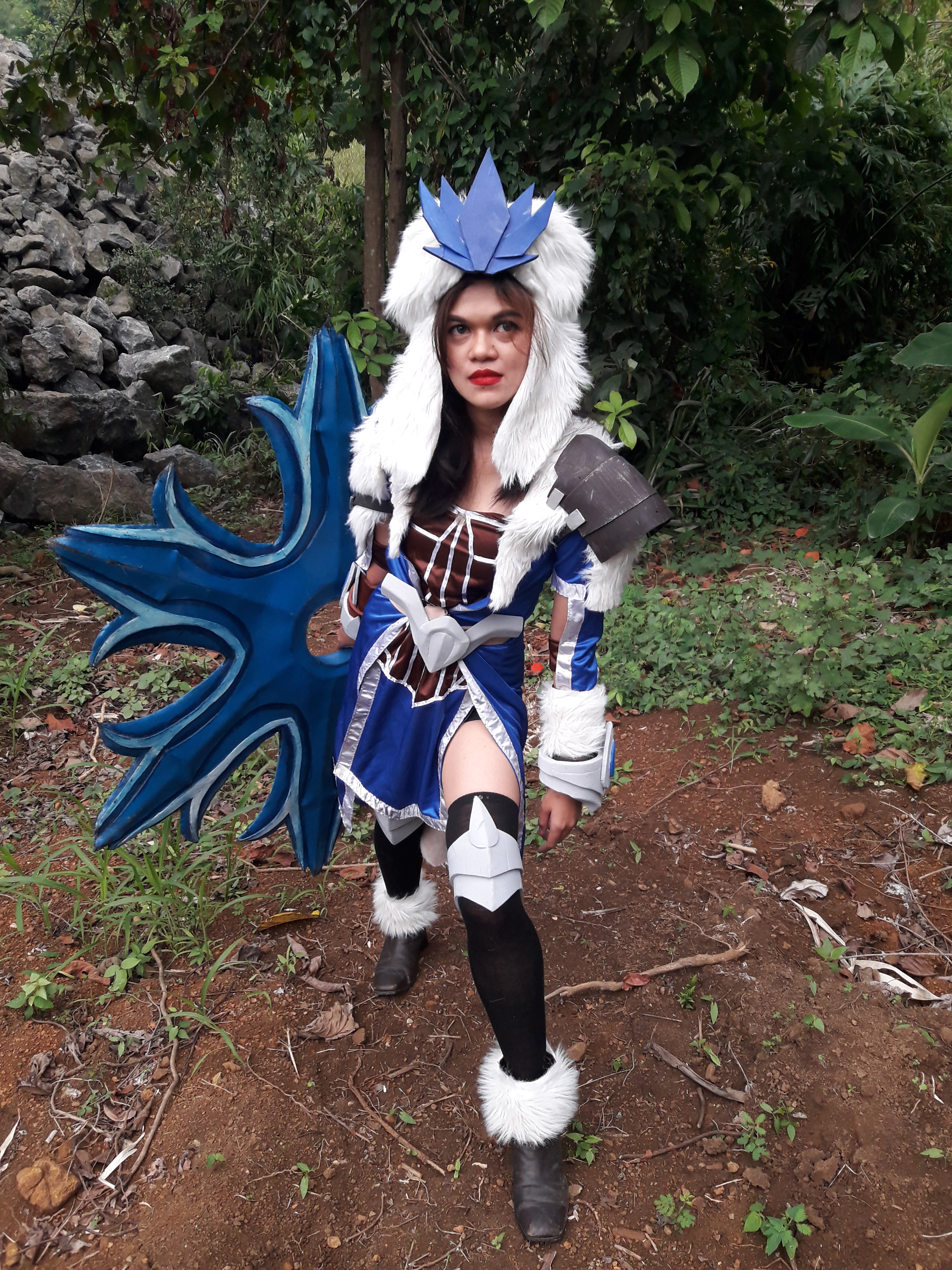 Cosplayer with fancy, furry clothes and a giant shuriken