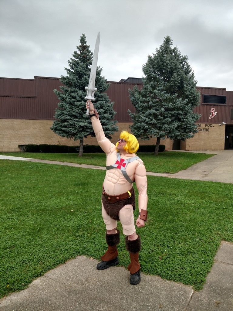 Cosplayer dressed as cartoonish-looking He-man