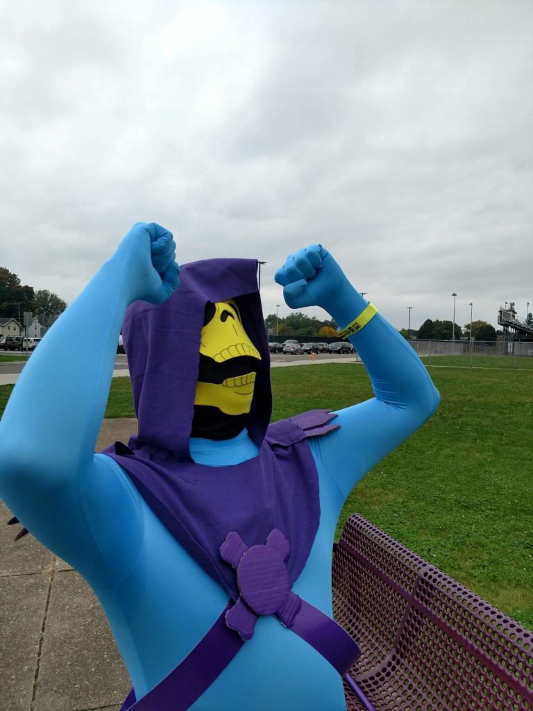 Cosplayer dressed as cartoonish-looking Skeletor