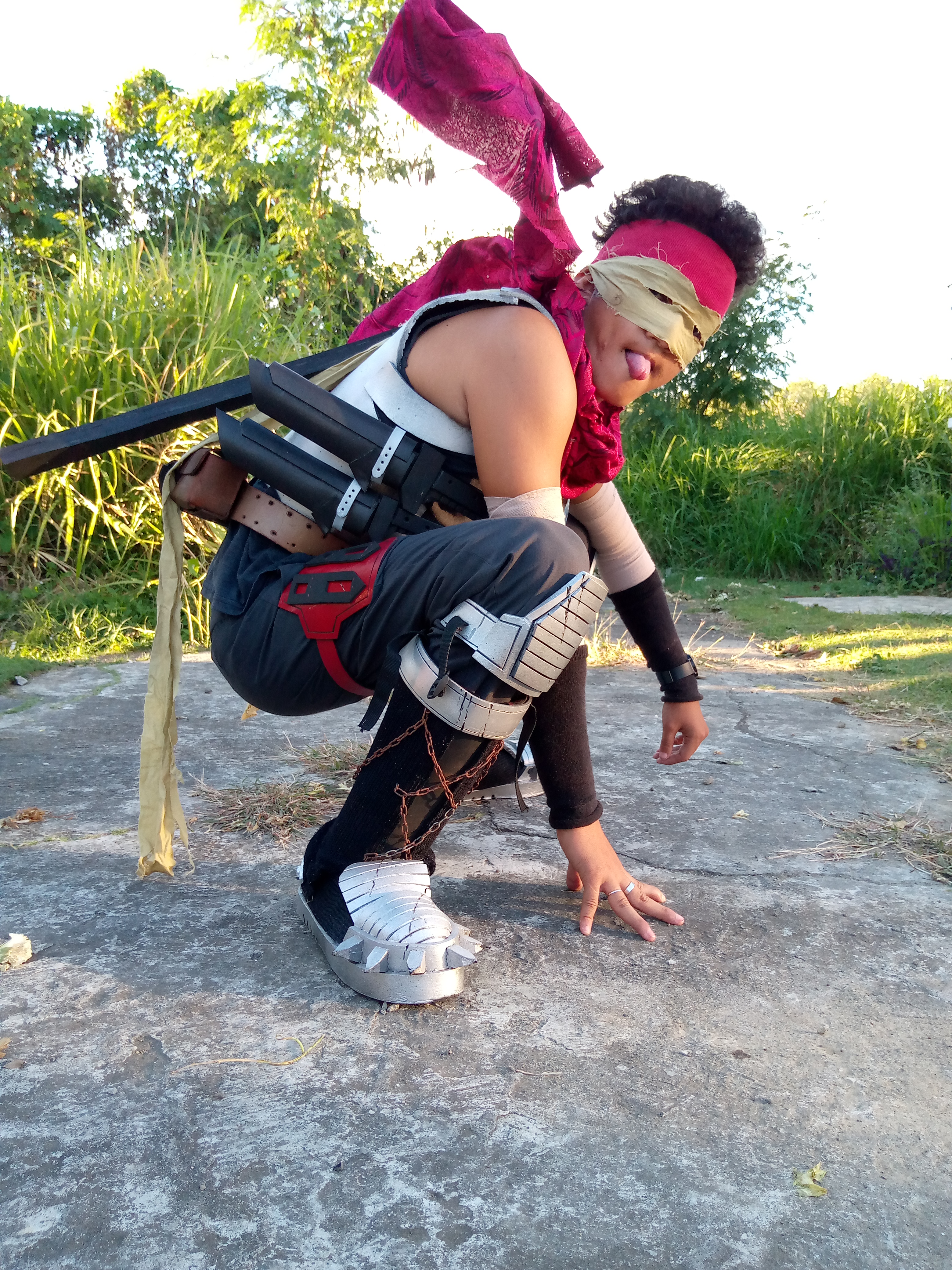 Ninja-looking guy, bent over