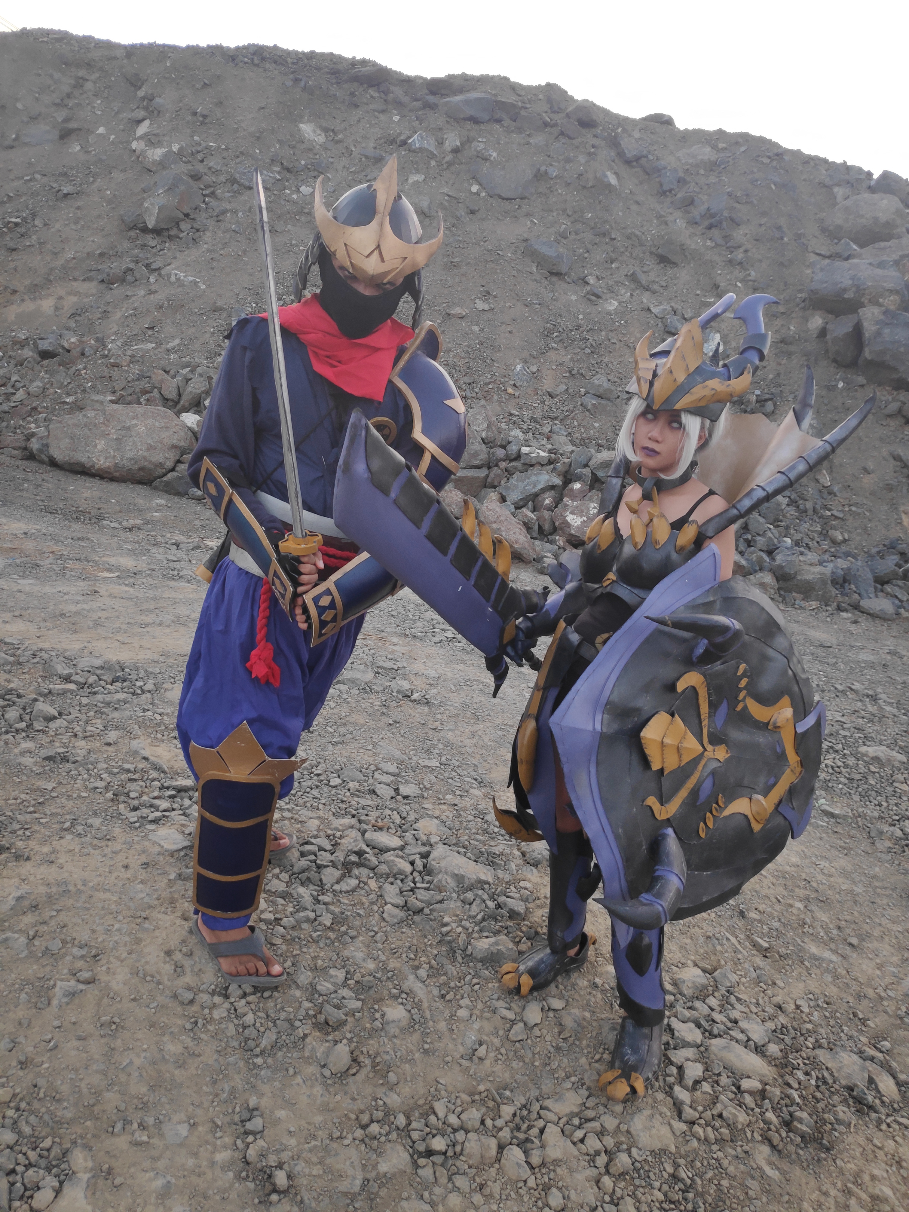 Two armored cosplayers facing the camera