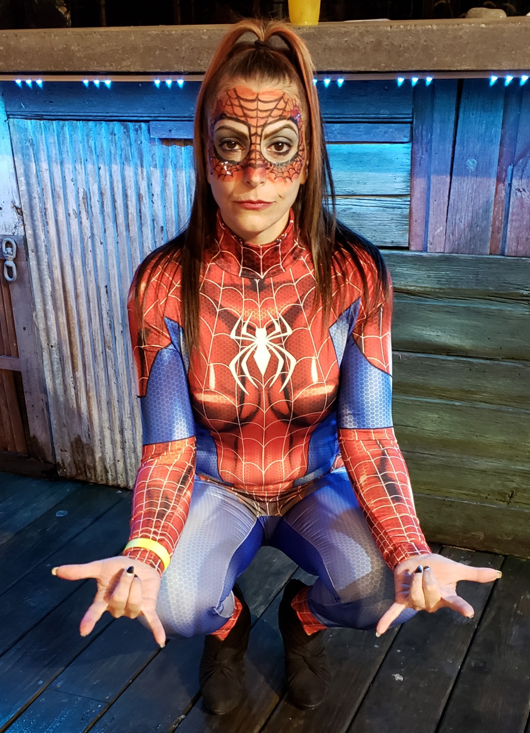 Red, white and blue shiny Spider suit. Just your friendly neighborhood Spider-girl!