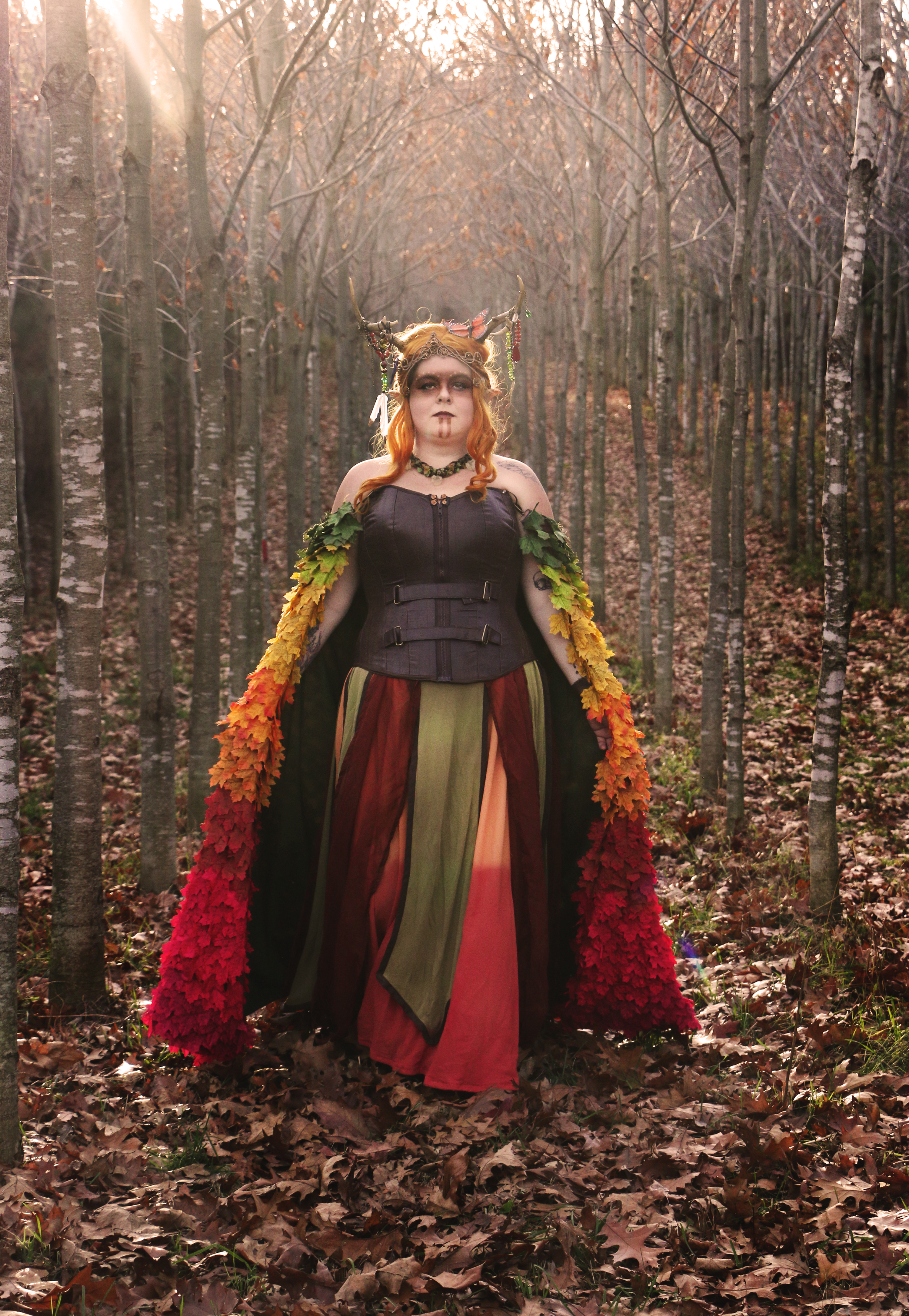 Keyleth, being a Druid - we decided to take photos outdoors, we happened to have a very warm fall day after the leaves had fallen so the bright colours of the cloak (which is made up of several thousand gradient dyed leaves) would pop out.