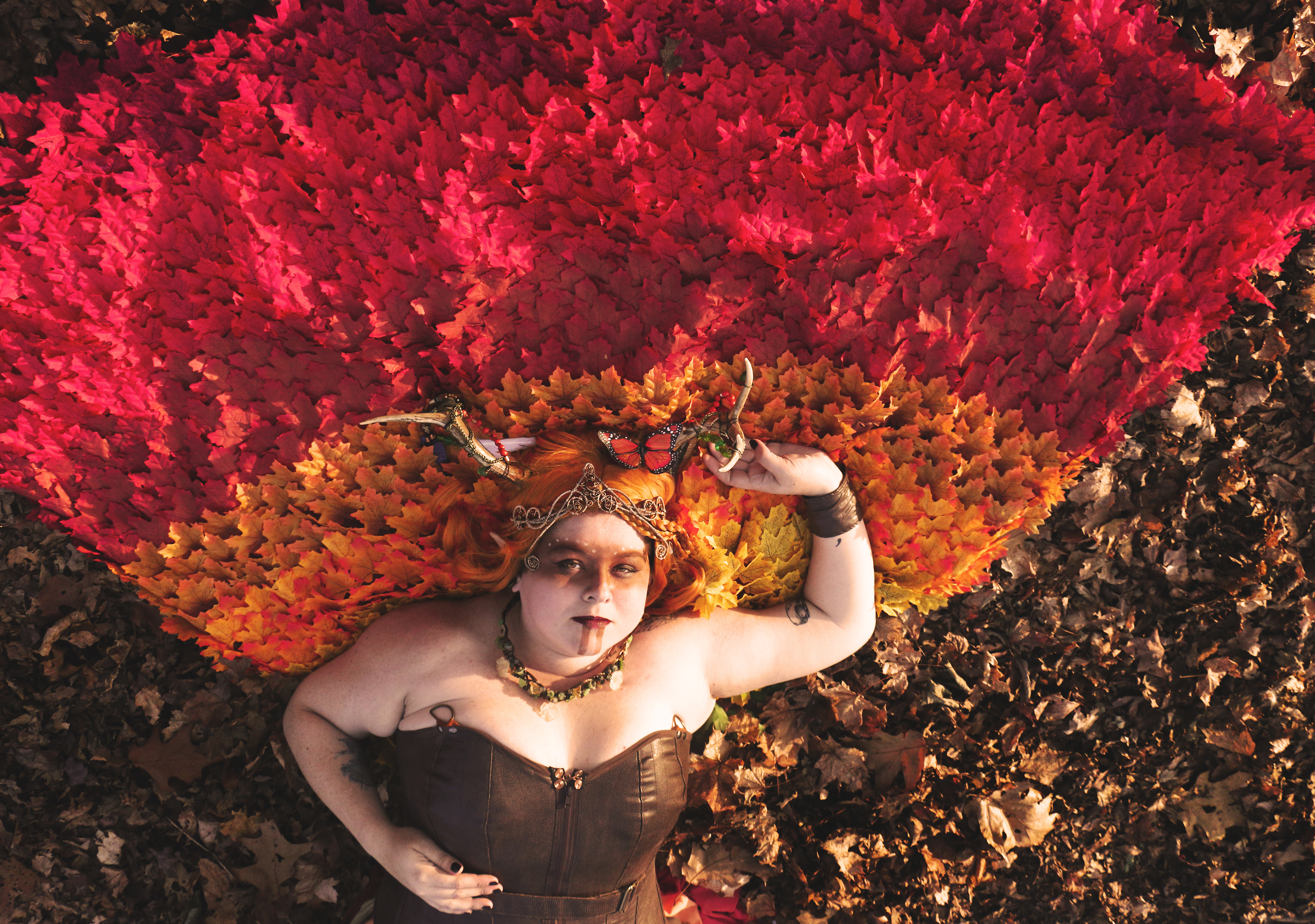 Keyleth, being a Druid - we decided to take photos outdoors, we happened to have a very warm fall day after the leaves had fallen so the bright colours of the cloak (which is made up of several thousand gradient dyed leaves) would pop out.