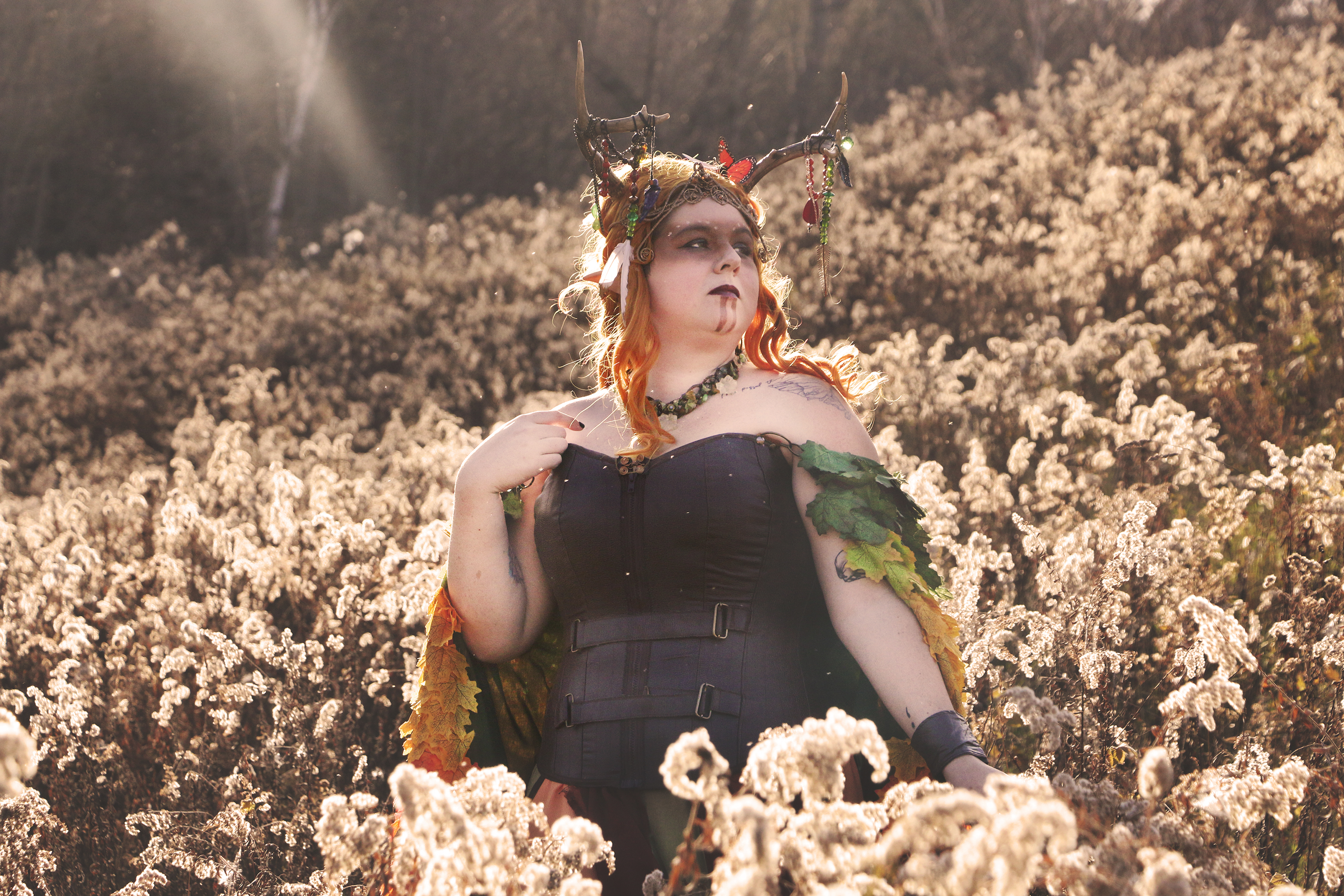 Keyleth, being a Druid - we decided to take photos outdoors, we happened to have a very warm fall day after the leaves had fallen so the bright colours of the cloak (which is made up of several thousand gradient dyed leaves) would pop out.