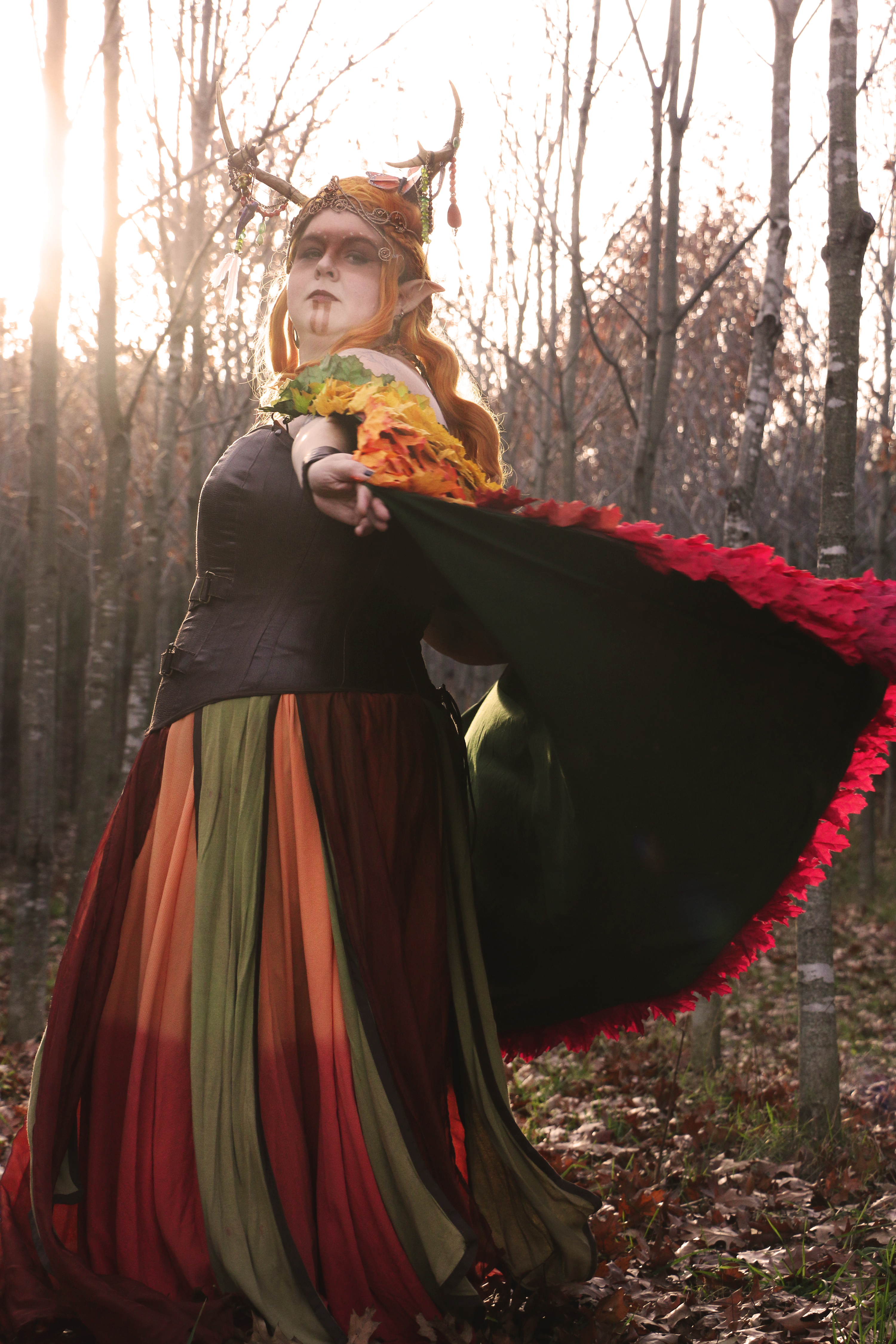 Keyleth, being a Druid - we decided to take photos outdoors, we happened to have a very warm fall day after the leaves had fallen so the bright colours of the cloak (which is made up of several thousand gradient dyed leaves) would pop out.