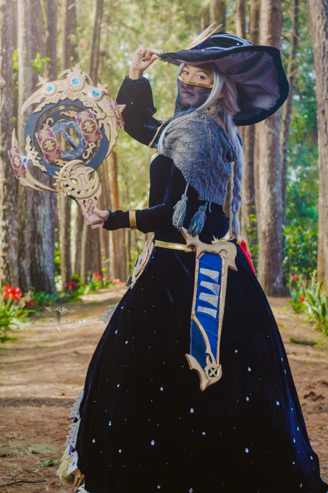 Here is my Astrologian Build! Made 100% by me! I used different methods to bring her to life. She has LED lights in the astroglobe (prop) her hat, and some other detail in the belt! This was the first time making a ball gown type dress, and I couldnt be happier with her! I made her in 2019 just before the pandemic hit, so she holds a place close to my heart. Materials used; Dress; black velvet, gold lycra, grey cottonblend everything is hand painted, and the crystals were glues on in a constallation pattern, Prop; MDF wood, Foam, and acrilic, this prop rotates (Manually) just to give it a sense of life! All of the small white details along the skirt were all hand cut. There is aprox. 150+ Hours in making the whole thing from start to finish, she took me a bit more than a month to complete!