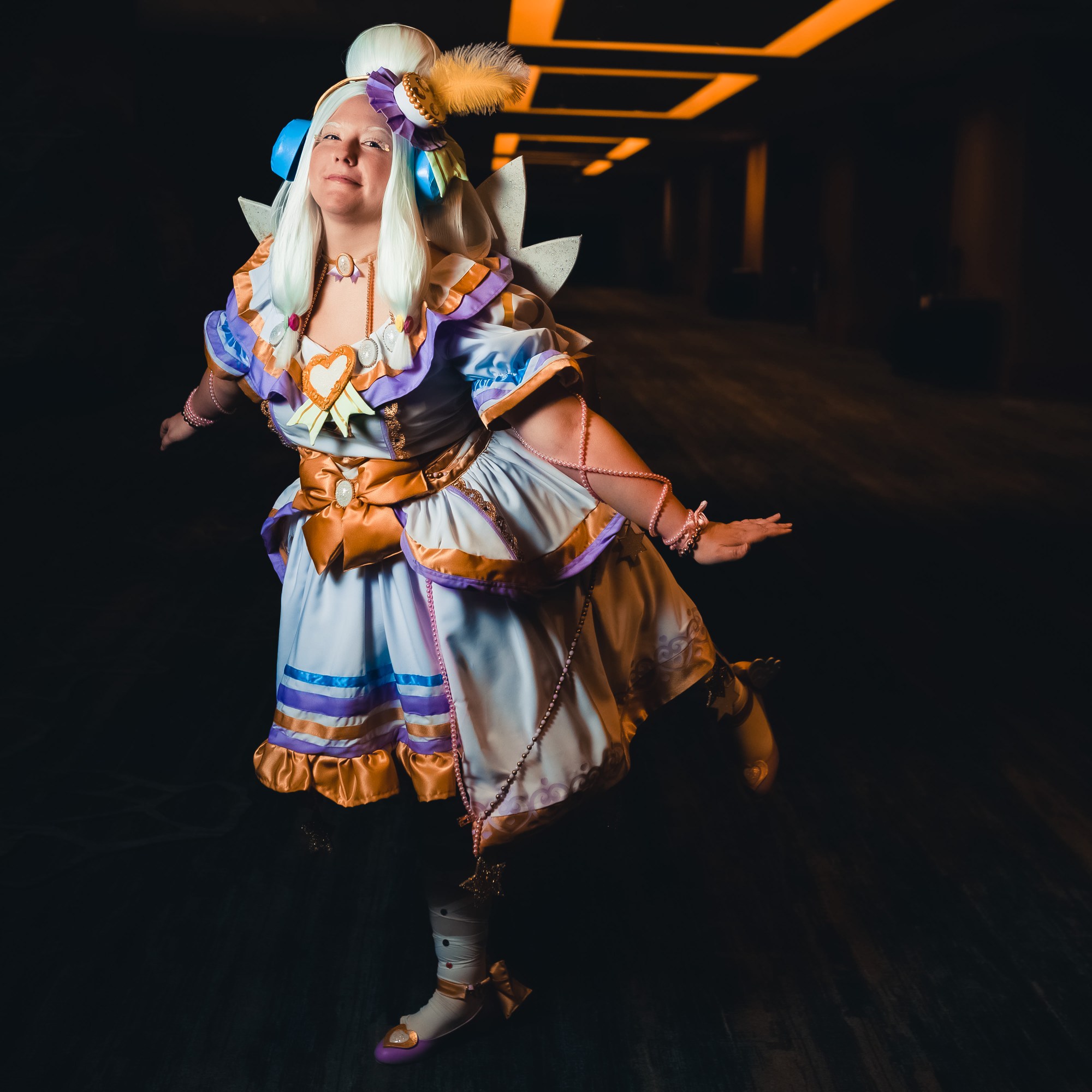 Everything is hand made and I have a digital build book on my Instagram (@summerfirecosplay) under PriPara. The wig was dyed by my own paint water method (it’s non crunchy & tutorial is on my TikTok @summer_fire_cosplay) all the bows are plush made so they are soft. The heart trim was designed in my design space for cricket & is htv. The cosplay is 6 pieces, wig, blouse, over skirt, underskirt, & petticoat. All made by me. The shoes & stockings are made/heavily altered by me as well. The opal gems are all resin and the wings are Eva foam with opal glitter over them as well.